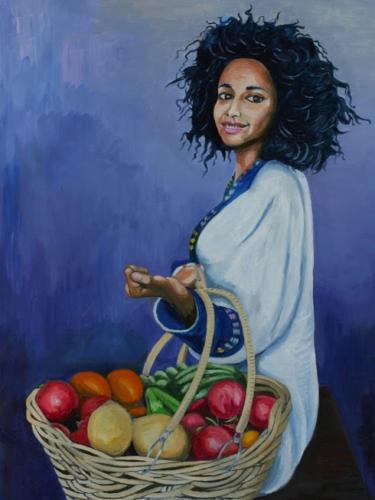 Ragazza etiope con cesto di frutta